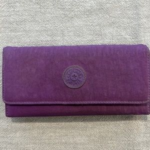 Kipling used wallet. Still in great shape with lots of life left